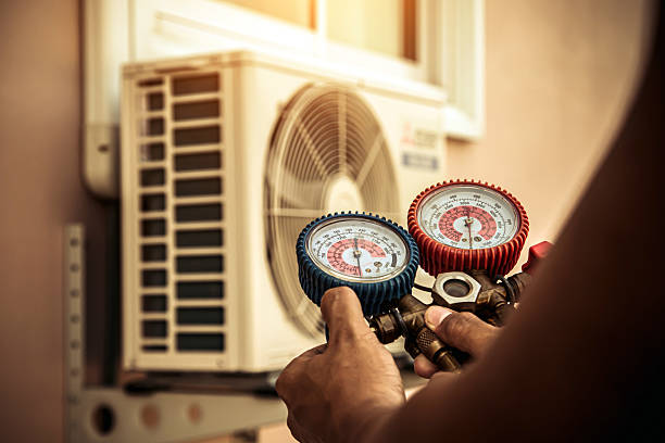 Professional Air Conditioning Service technician working in Keystone, FL